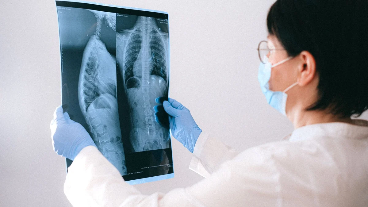 A radiologist reviewing a scan