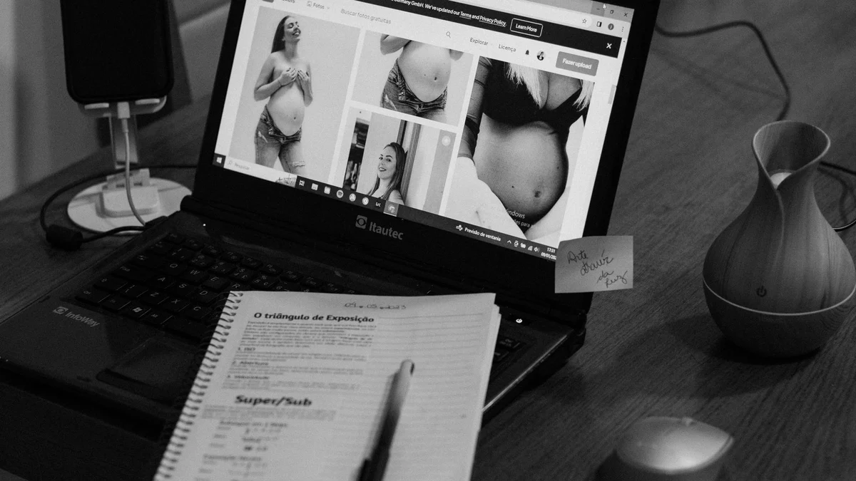 A researcher searching for papers on a laptop